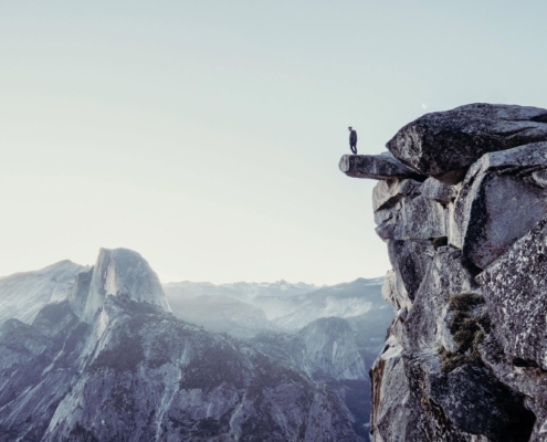 Man sitting on rock